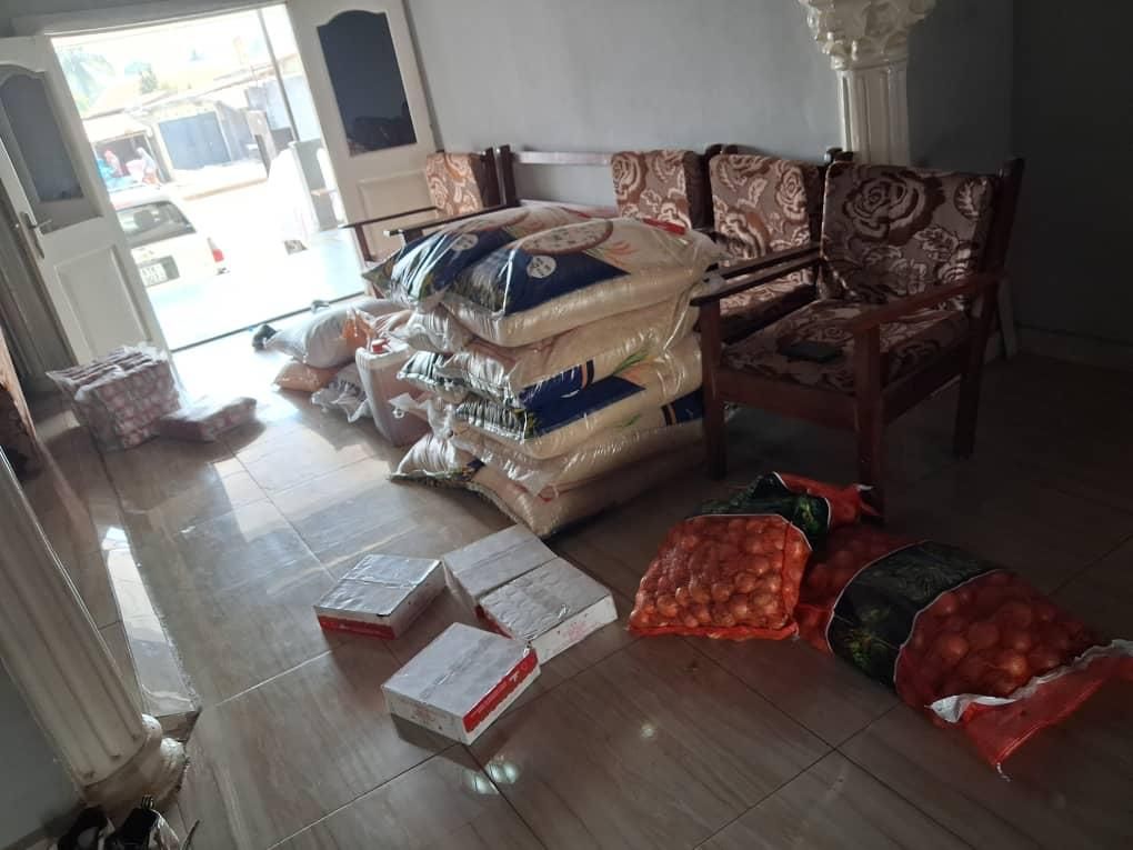 Bags of rice, onions and boxed supplies ready for distribution
