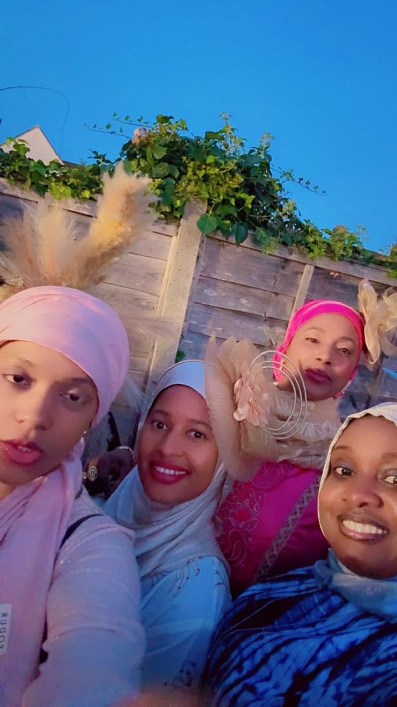 Members taking a selfie at a garden event