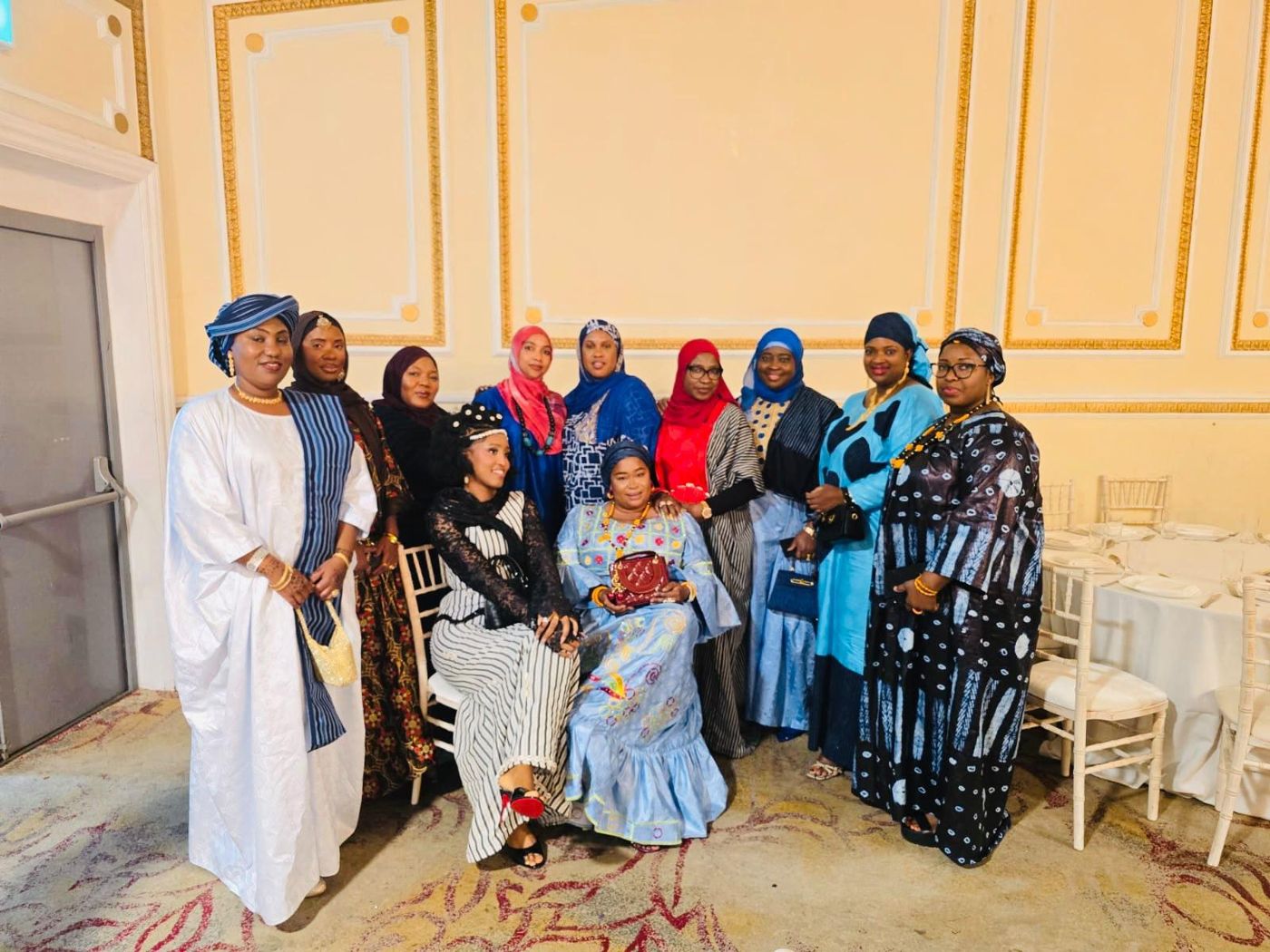 Members of the association in traditional Fullah dress at a formal gathering